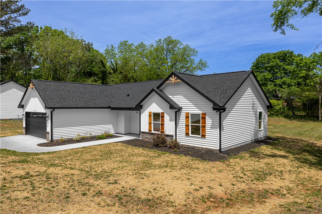105 Leon Drive Anderson, SC 29621 - Photo 32 of 46 This newly constructed home features charming exterior details and an attached garage.