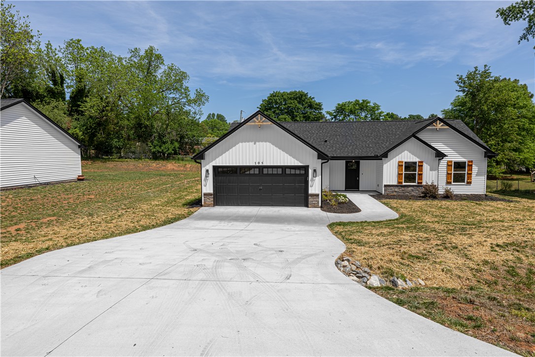 105 Leon Drive Anderson, SC 29621 - Photo 34 of 46 This charming residence features a spacious driveway, perfect for welcoming guests.