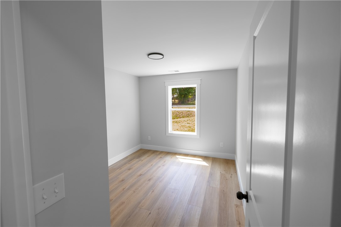 105 Leon Drive Anderson, SC 29621 - Photo 36 of 46 This bright room features light flooring and a window, offering a versatile space.