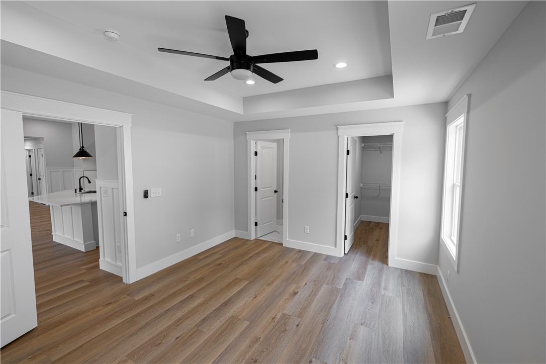 105 Leon Drive Anderson, SC 29621 - Photo 39 of 46 This spacious bedroom offers comfortable living with elegant flooring and ample closet space.