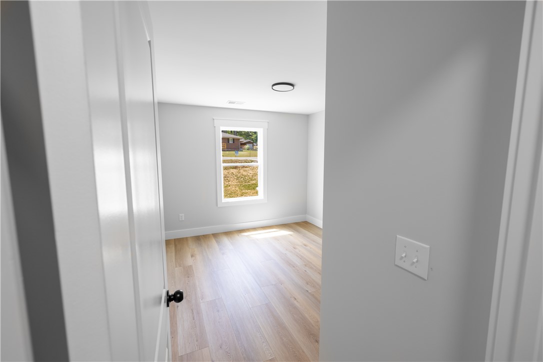 105 Leon Drive Anderson, SC 29621 - Photo 43 of 46 This bright room features a large window overlooking the outdoors, offering natural light.