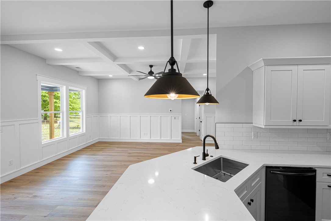 105 Leon Drive Anderson, SC 29621 - Photo 8 of 46 This bright, open concept kitchen and living area showcases clean lines and modern finishes.