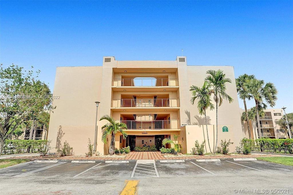 8500 Southwest 133rd Avenue Road, Unit 116 Miami, FL 33183 - Photo 3 of 15 a front view of a building with street view