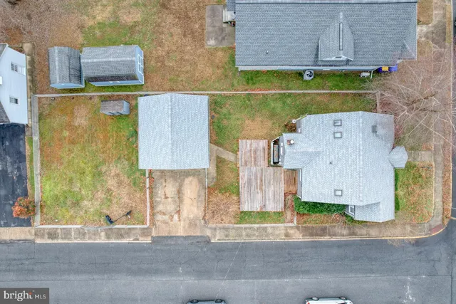 an aerial view of a highlighted house