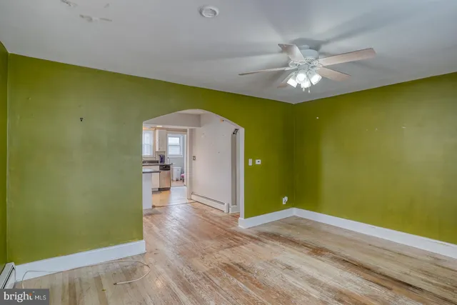a view of a livingroom with wooden floor