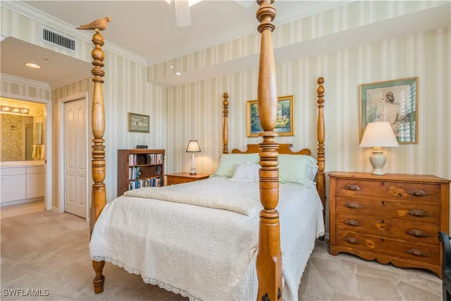 a bed room with a bed and a dresser