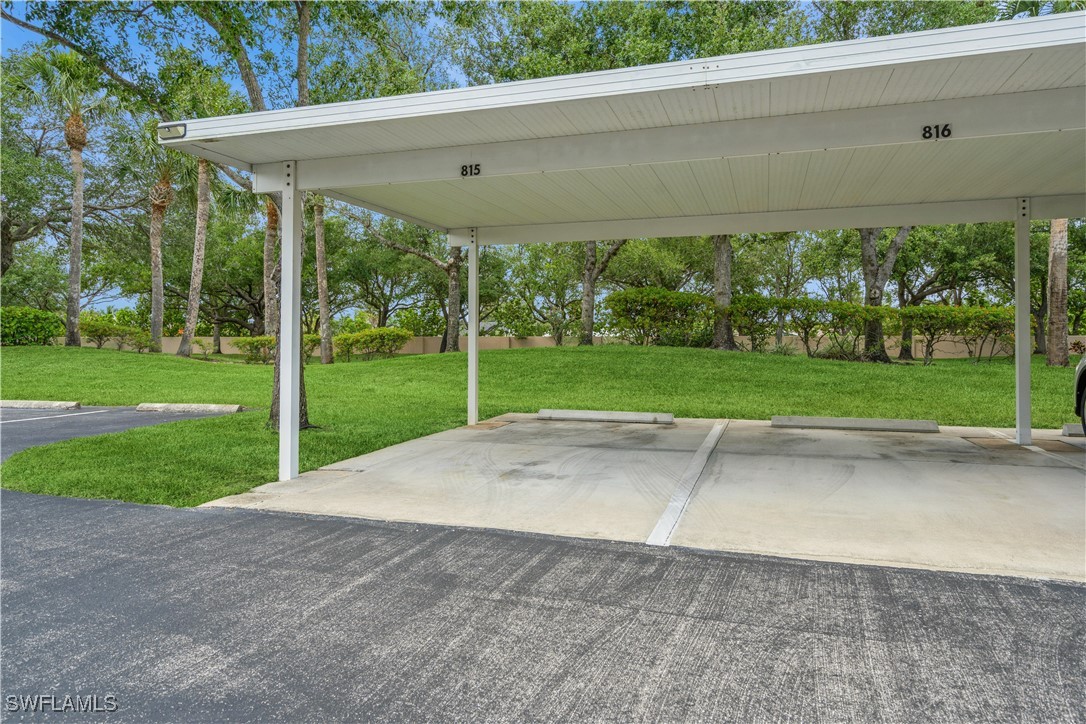 14051 Brant Point Circle, Unit 8105 Fort Myers, FL 33919 - Photo 24 of 33 a view of a house with backyard and garden