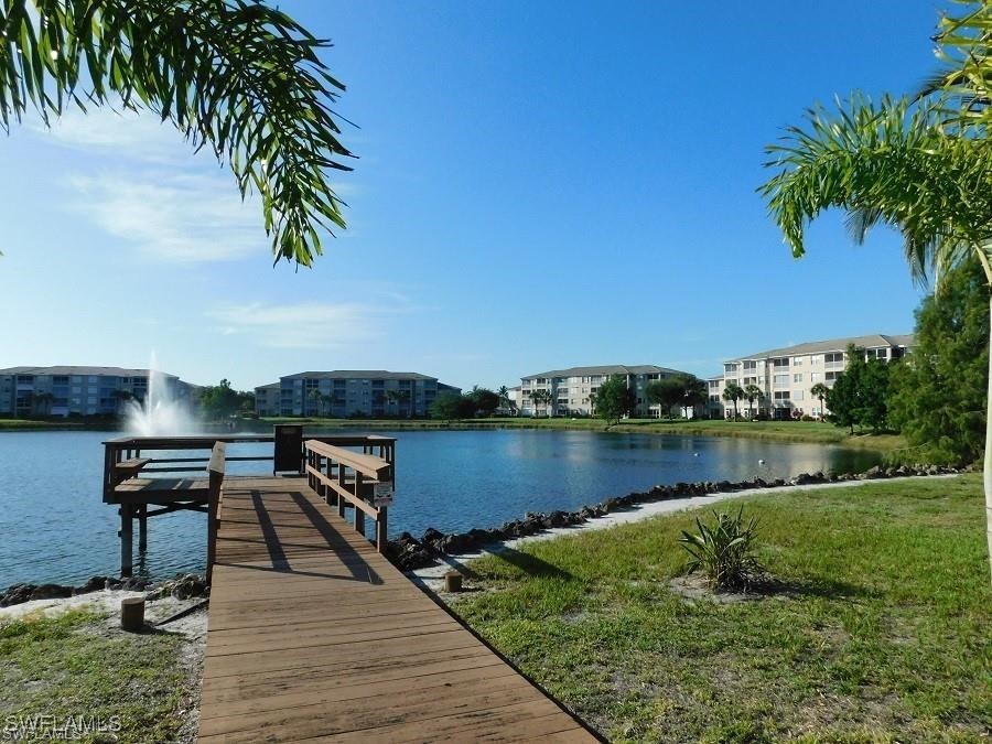 14051 Brant Point Circle, Unit 8105 Fort Myers, FL 33919 - Photo 28 of 33 a view of a lake with outdoor space