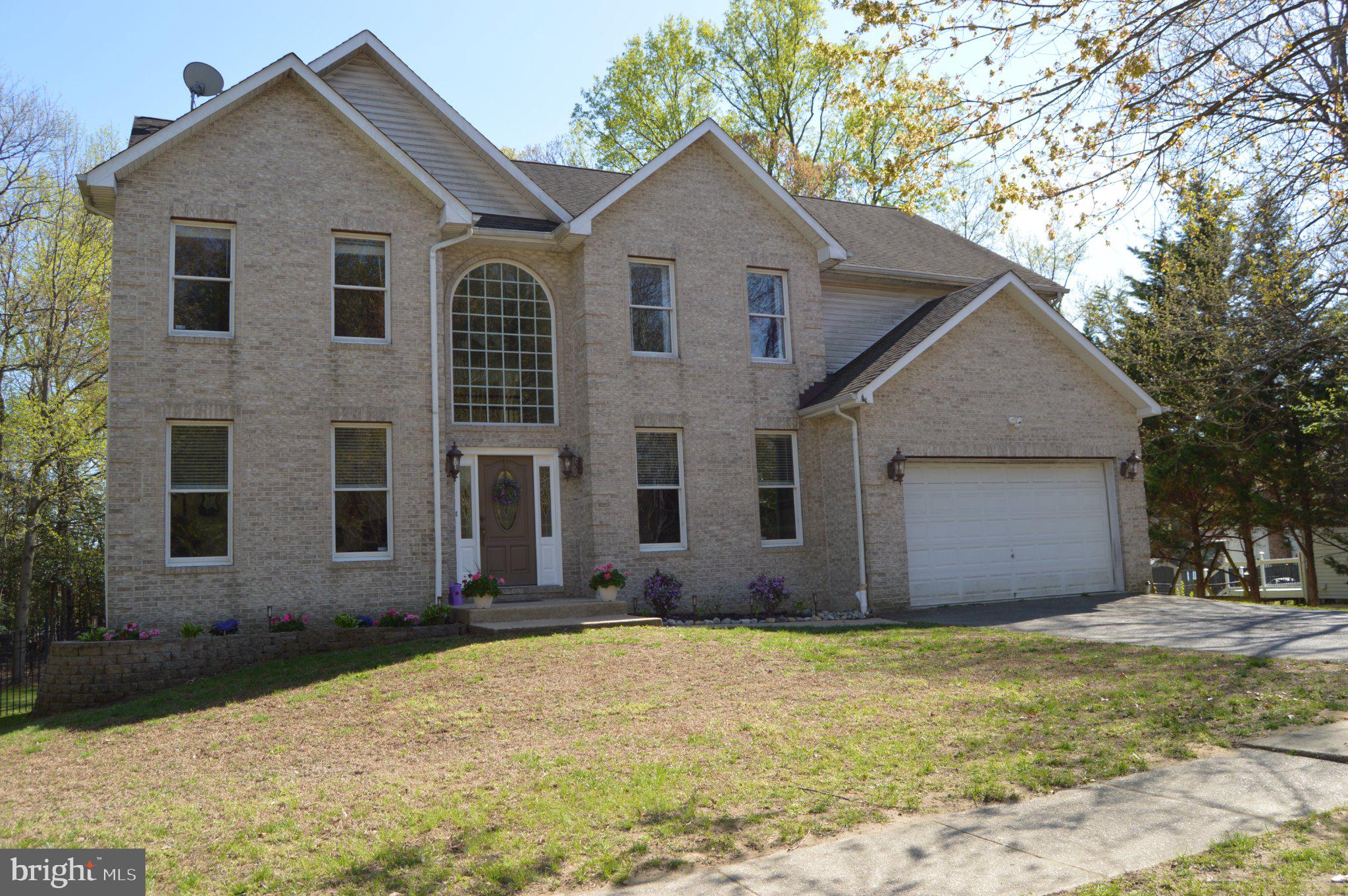 311 Riverdale Road Severna Park, MD 21146 - Photo 1 of 65 Charming brick home with lush surroundings.