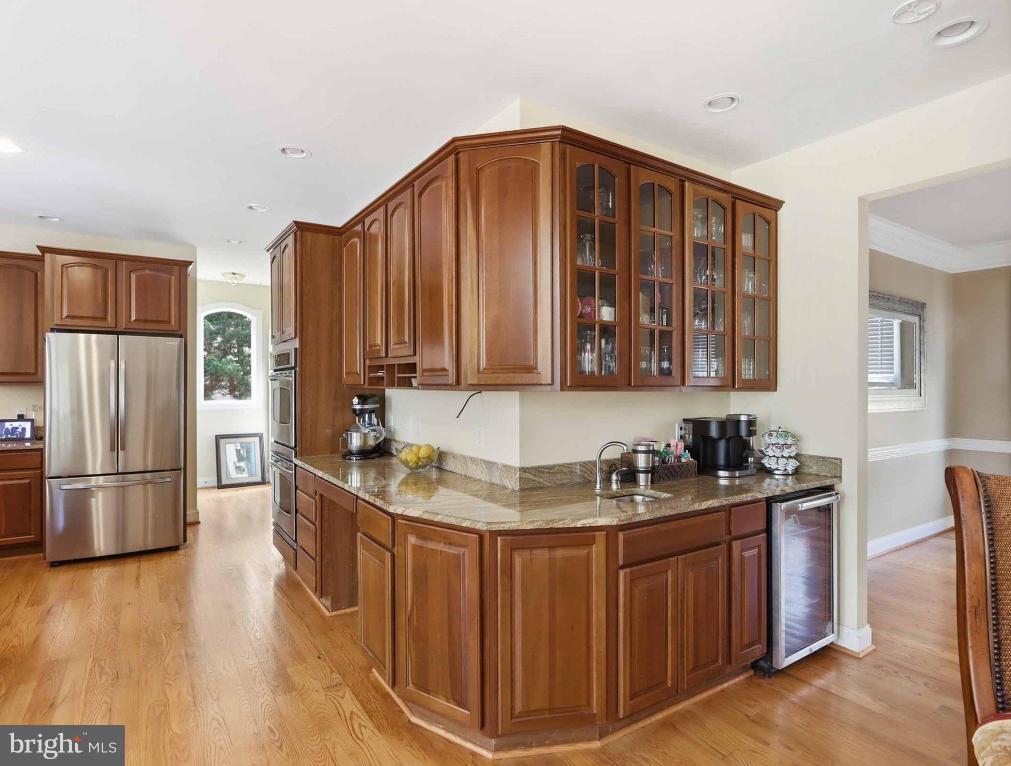 311 Riverdale Road Severna Park, MD 21146 - Photo 22 of 65 Warm wood tones in a modern kitchen.