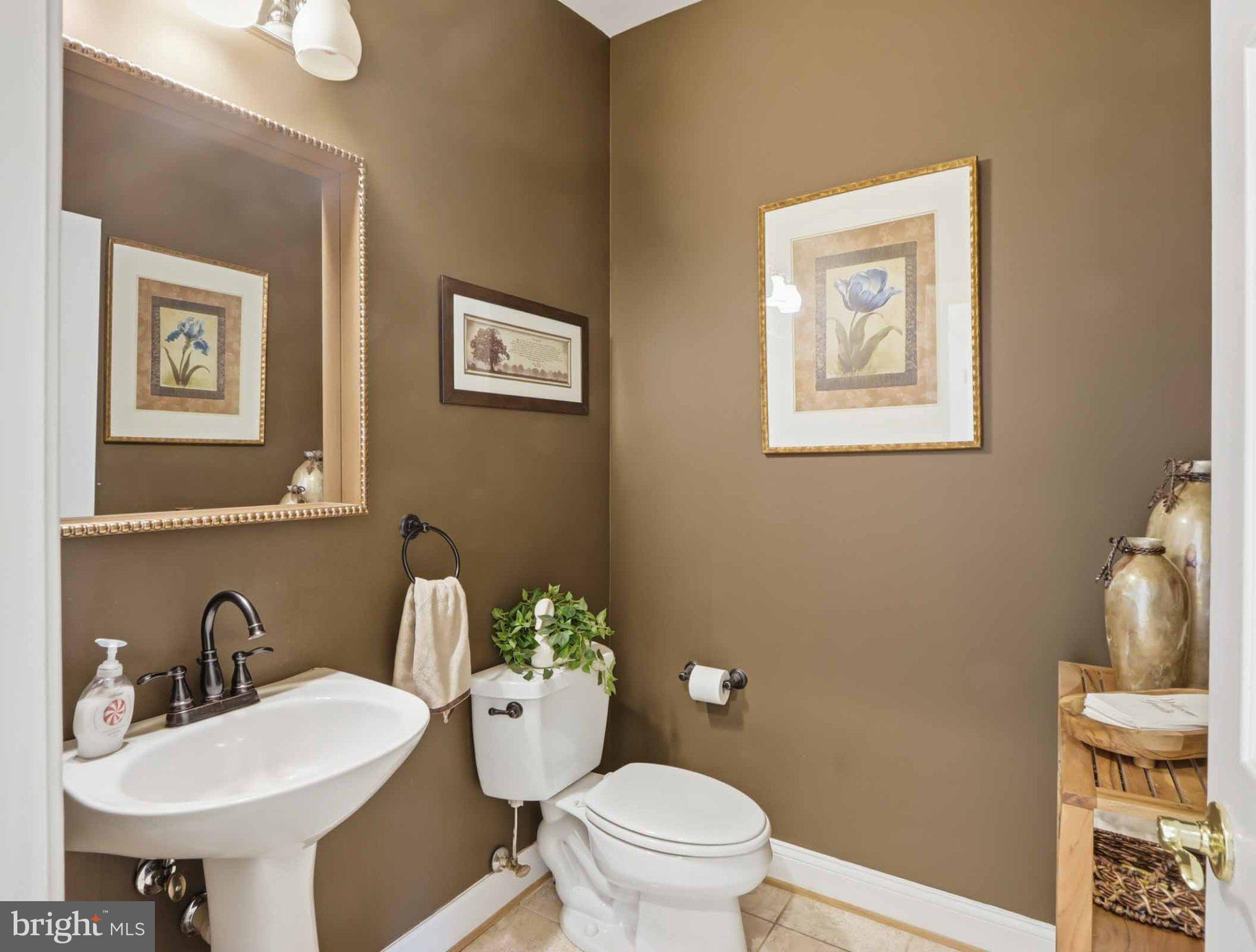 311 Riverdale Road Severna Park, MD 21146 - Photo 23 of 65 Chic half-bath with earthy tones.