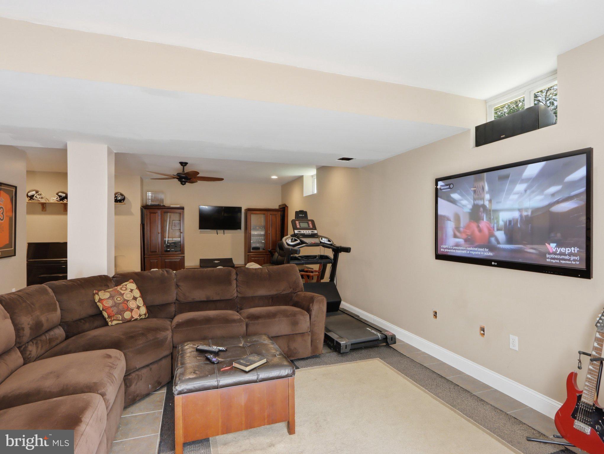 311 Riverdale Road Severna Park, MD 21146 - Photo 45 of 65 Cozy basement retreat with modern flair.