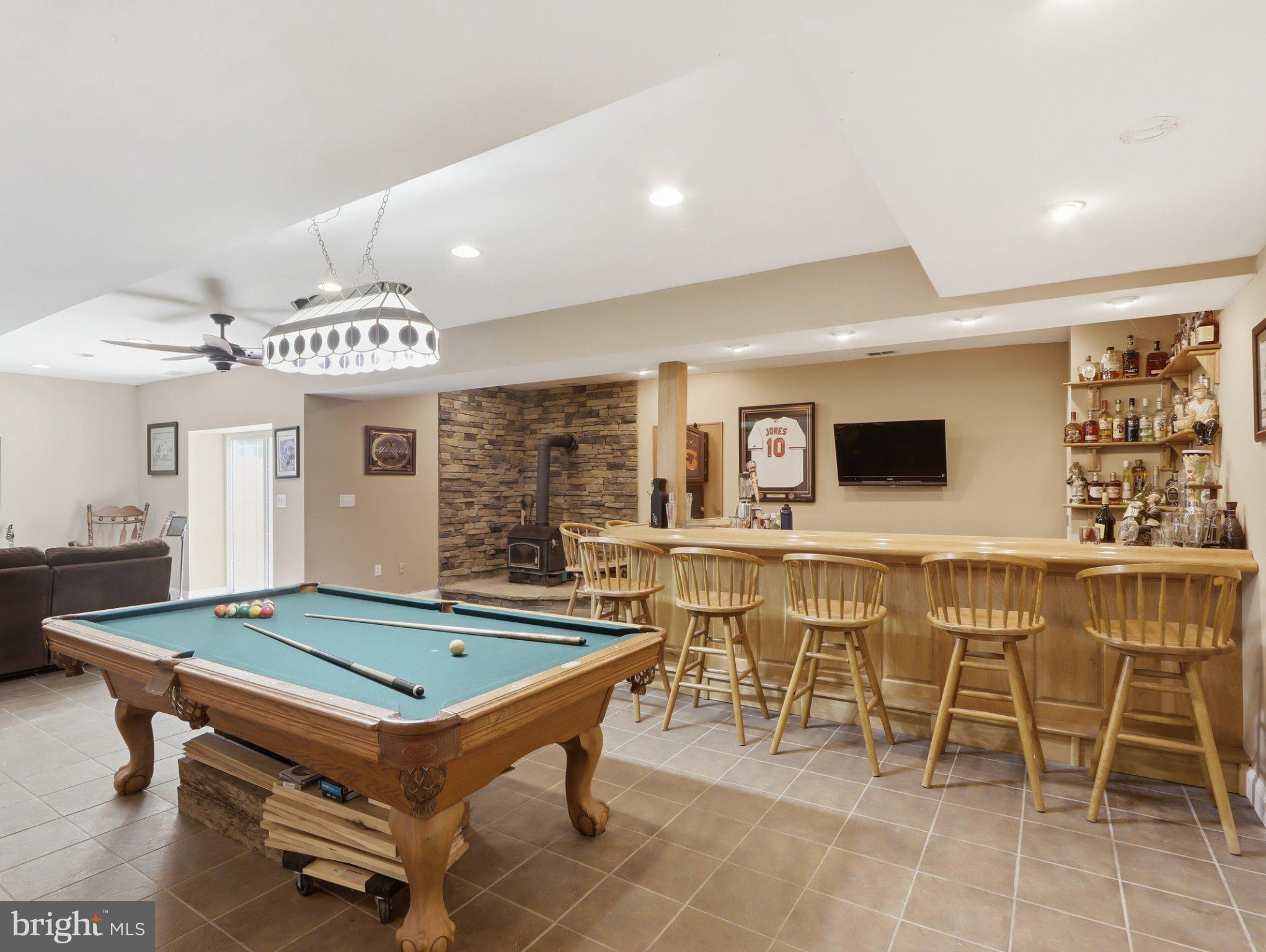 311 Riverdale Road Severna Park, MD 21146 - Photo 47 of 65 Inviting game room with bar area.