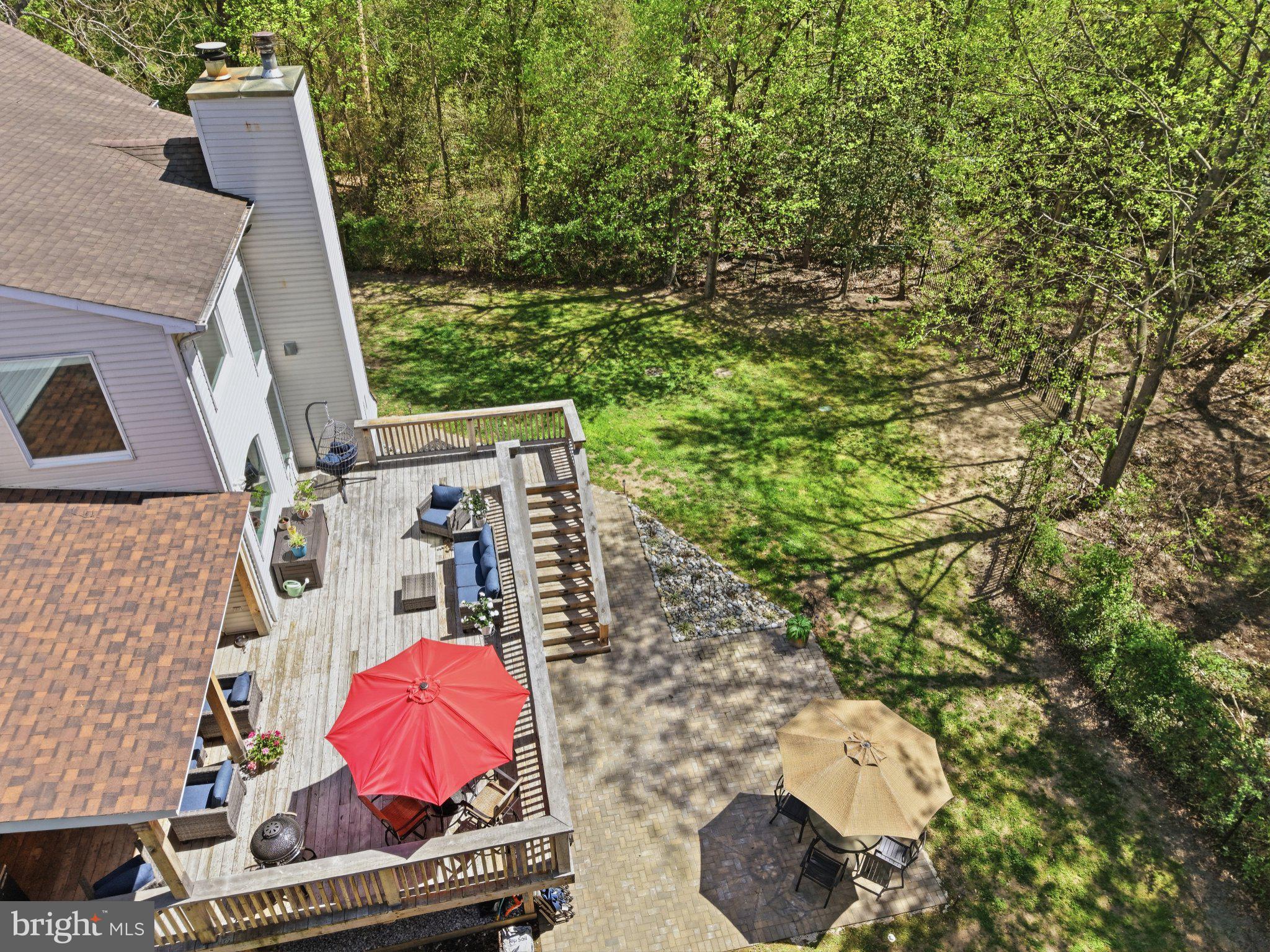 311 Riverdale Road Severna Park, MD 21146 - Photo 9 of 65 Serene outdoor retreat with lush greenery.