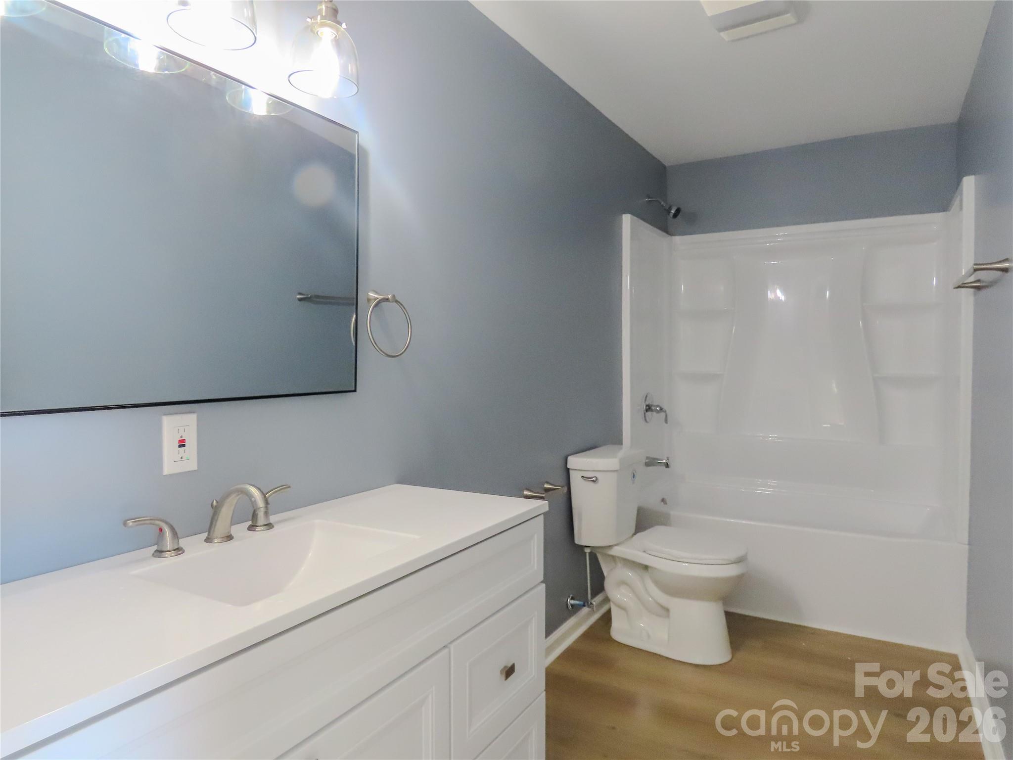 433 Clinton Avenue Lancaster, SC 29720 - Photo 18 of 28 a bathroom with a sink toilet and shower