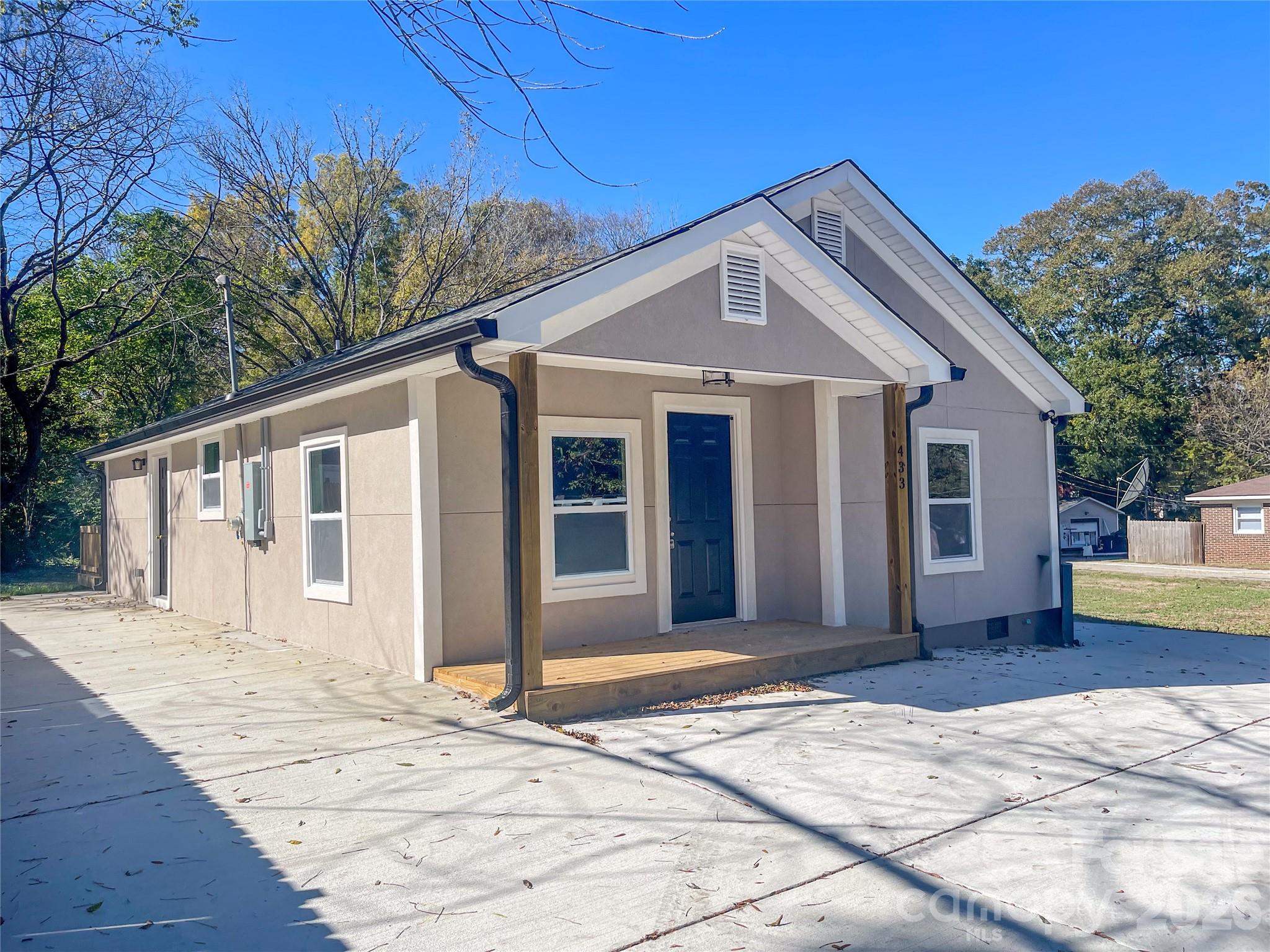 433 Clinton Avenue Lancaster, SC 29720 - Photo 2 of 28 a front view of a house with a yard