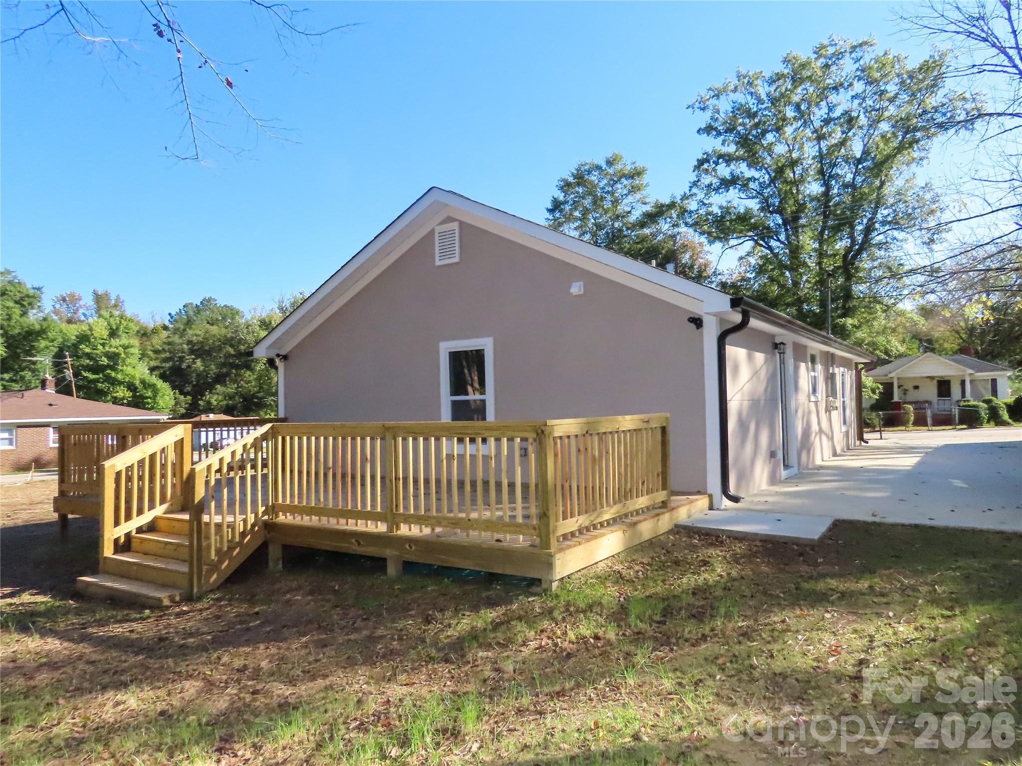 433 Clinton Avenue Lancaster, SC 29720 - Photo 3 of 28 a view of a house with a yard