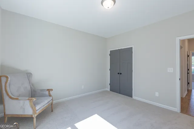 a view of chair and table in a room