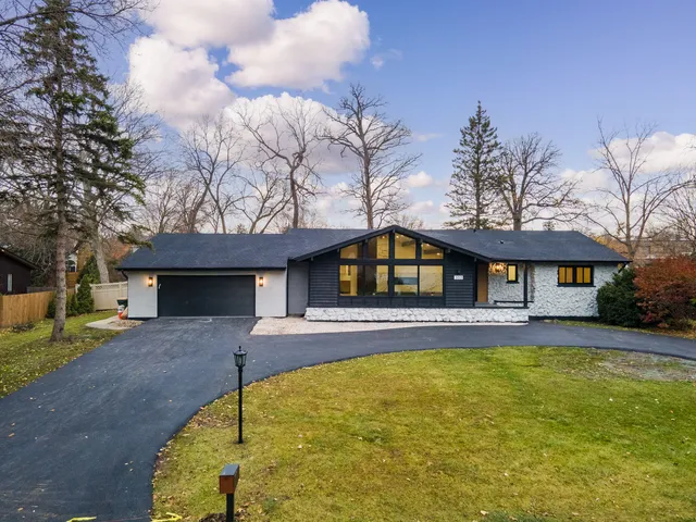 a view of swimming pool with a yard