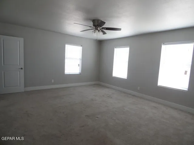 an empty room that has a window