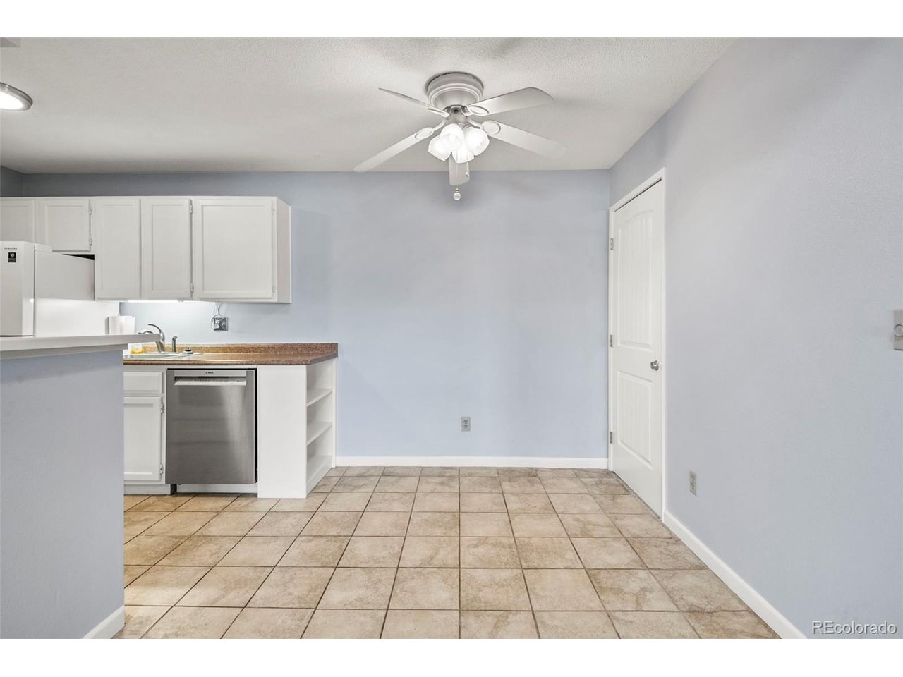 10150 East Virginia Avenue, Unit 2 Denver, CO 80247 - Photo 9 of 20 a view of an empty room with a window