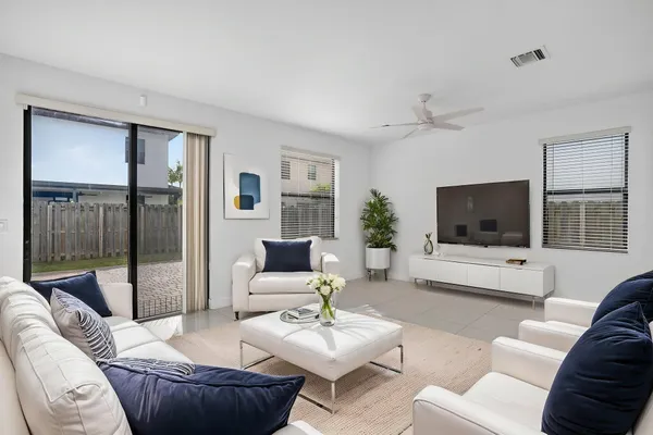a view of hallway with wooden floor
