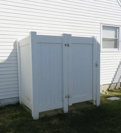 a view of a backyard of the house