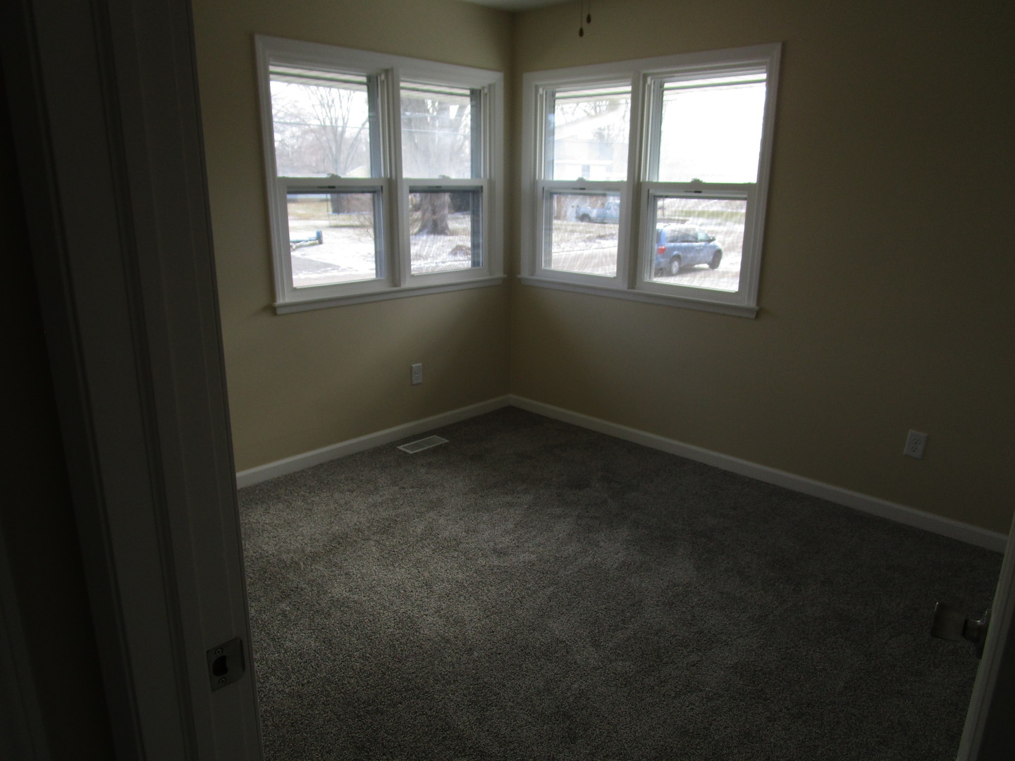 306 Grant Street Harvard, IL 60033 - Photo 11 of 14 a view of an empty room with a window