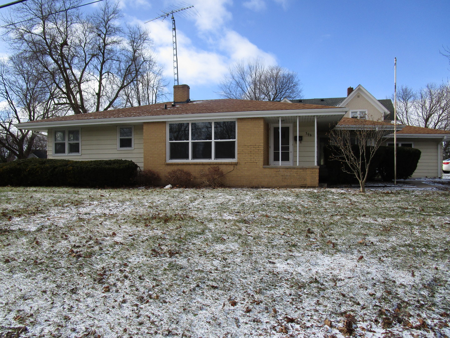 306 Grant Street Harvard, IL 60033 - Photo 2 of 14 a front view of a house with garden