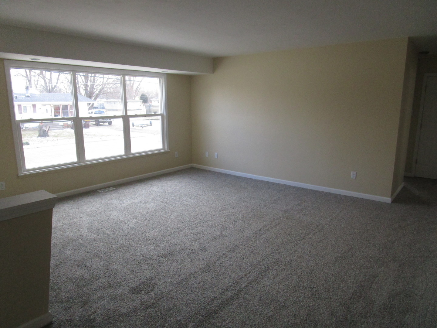 306 Grant Street Harvard, IL 60033 - Photo 7 of 14 an empty room with a window