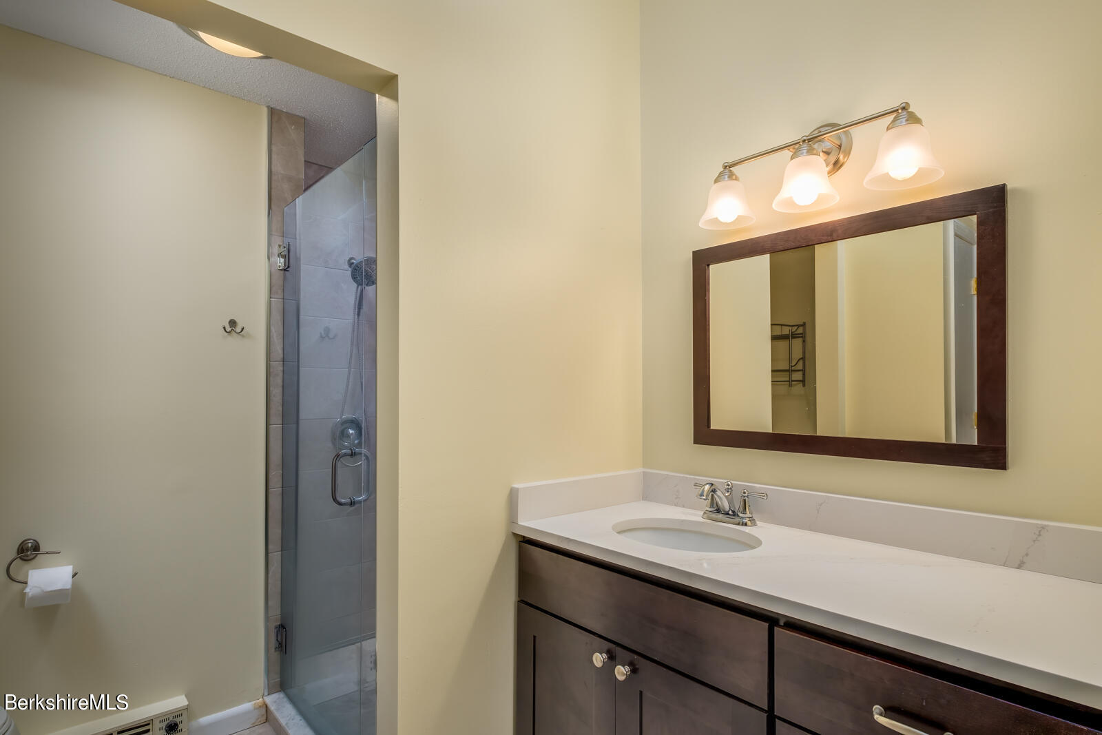 126 South Hemlock Lane Williamstown, MA 01267 - Photo 16 of 24 a bathroom with a sink and a mirror