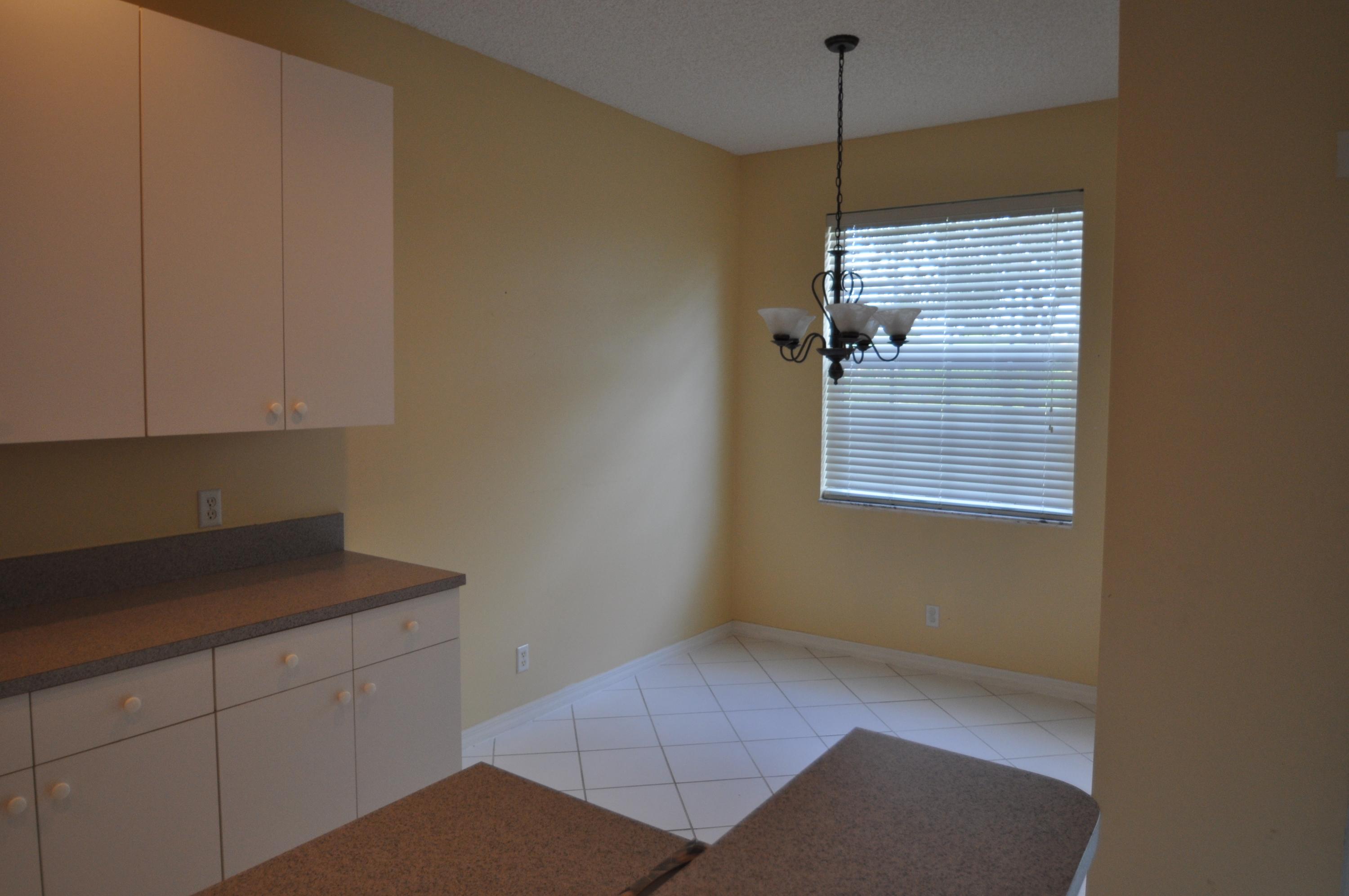 117 Lighthouse Circle, Unit G Tequesta, FL 33469 - Photo 7 of 26 kitchen and eat in area