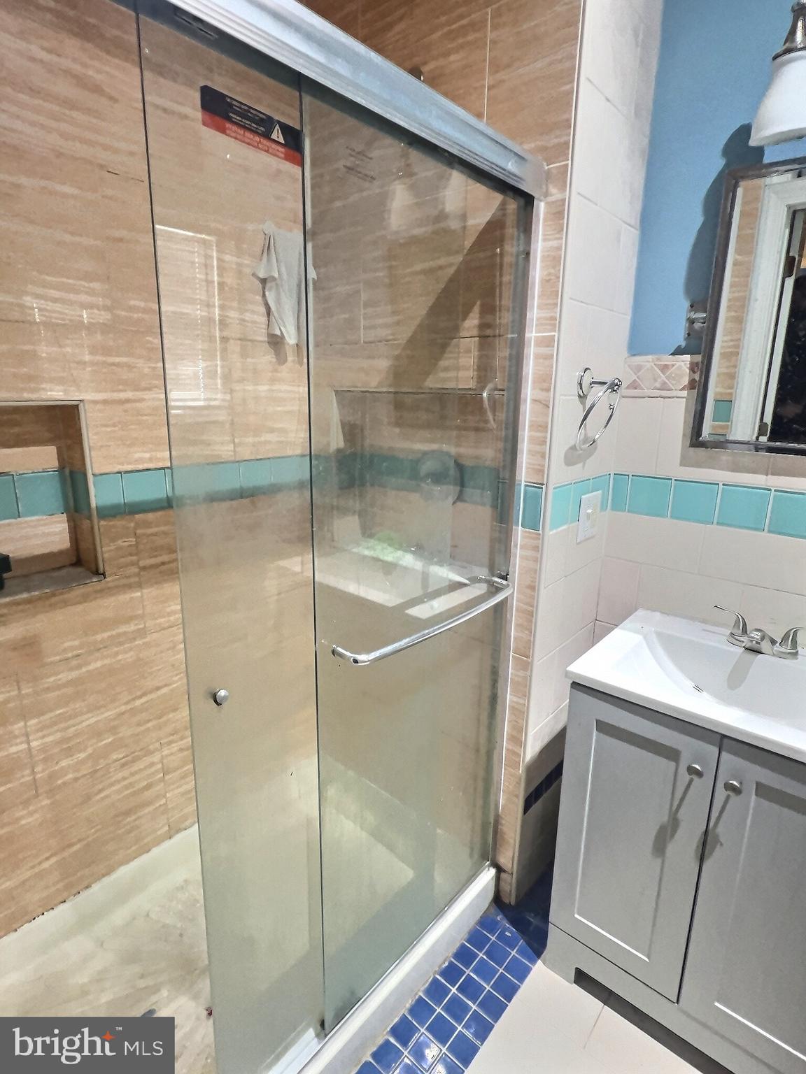 732 North 9th Street Reading, PA 19604 - Photo 6 of 7 a bathroom with a sink and a mirror