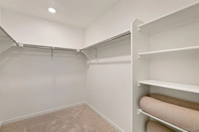 a view of an empty walk in closet