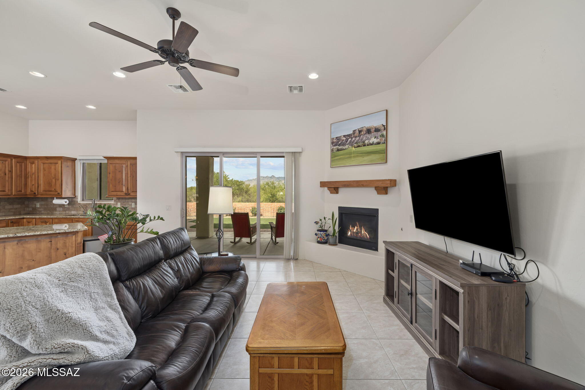 45 High View Court Tubac, AZ 85646 - Photo 21 of 44 a living room with furniture and a flat screen tv