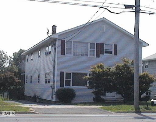 1245 Stratford Road Stratford, CT 06615 - Photo 1 of 1 a front view of a house with a garden