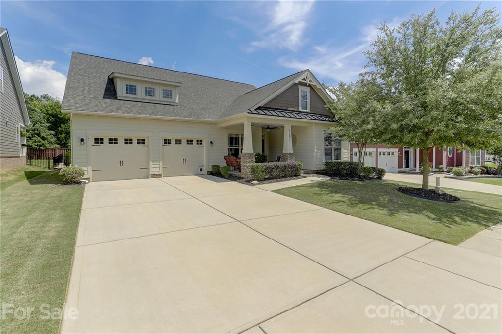 5202 Waterloo Drive Tega Cay, SC 29708 - Photo 1 of 44 a front view of house with yard