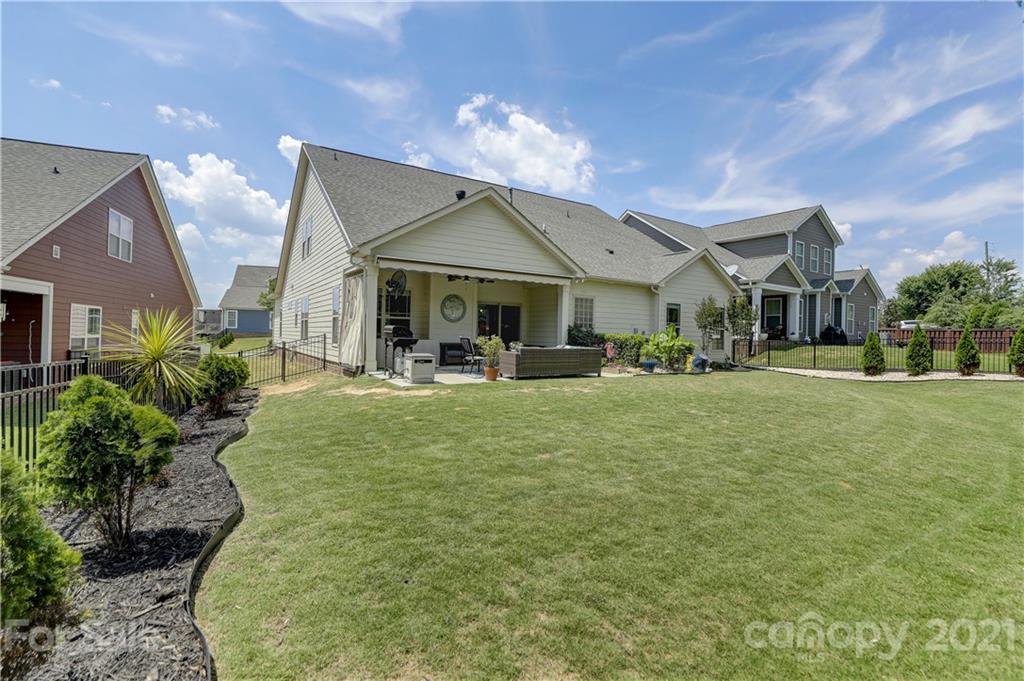 5202 Waterloo Drive Tega Cay, SC 29708 - Photo 37 of 44 a view of a house with a swimming pool