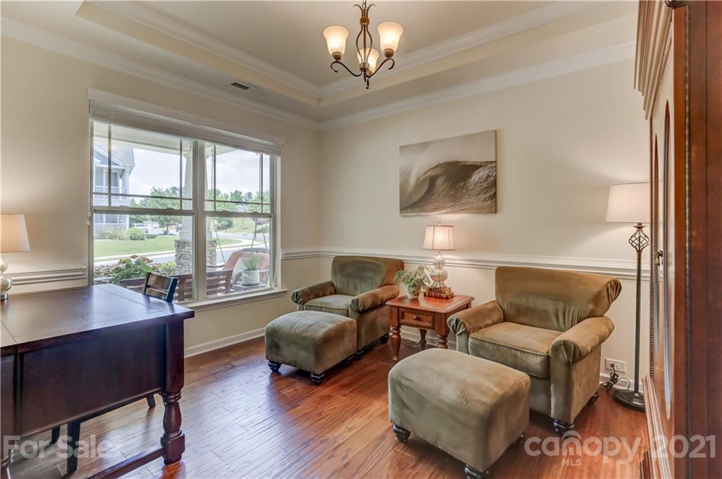 5202 Waterloo Drive Tega Cay, SC 29708 - Photo 7 of 44 a living room with furniture and a large window