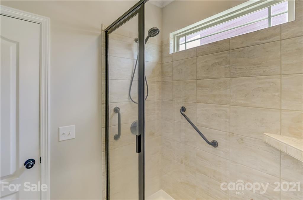 5202 Waterloo Drive Tega Cay, SC 29708 - Photo 10 of 44 a bathroom with a shower