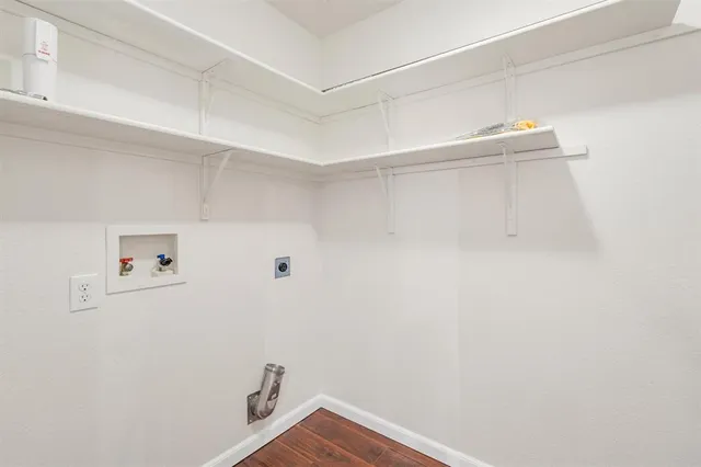 a view of small space with racks on the wall