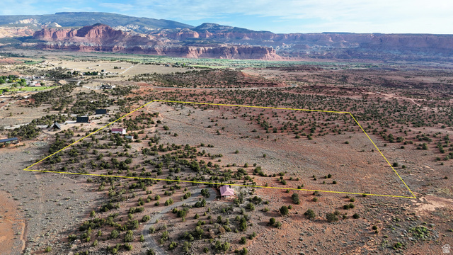 358 South Sky Drive Torrey, UT 84775 - Photo 2 of 82 Expansive desert landscape with a defined property boundary