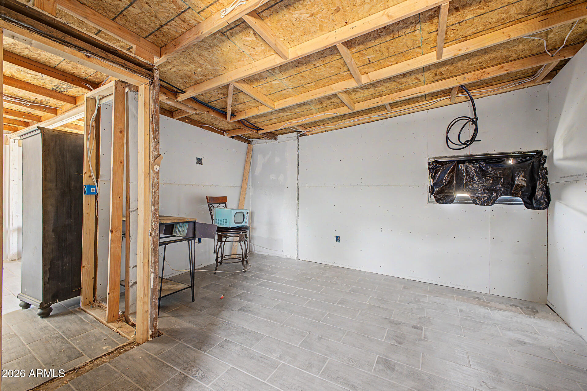 1612 South 5th Street Phoenix, AZ 85004 - Photo 10 of 27 a view of a room with racks on the wall