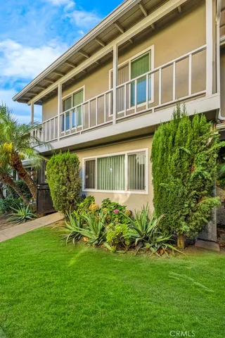 a brick building with a garden
