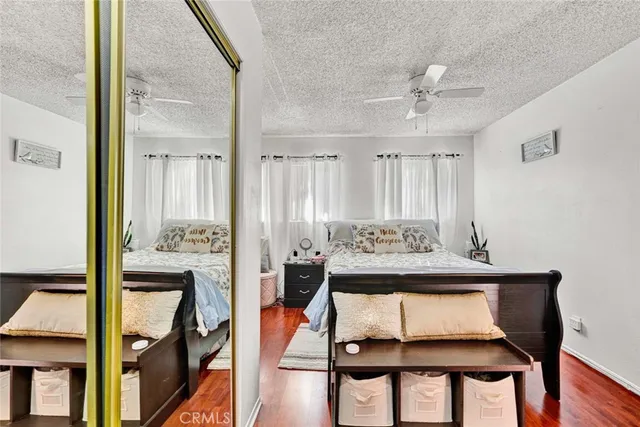 a bathroom with a sink a mirror and a shower