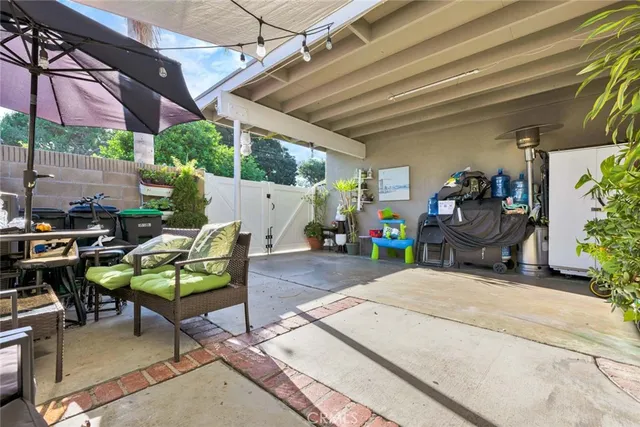 a view of a chairs and tables in patio