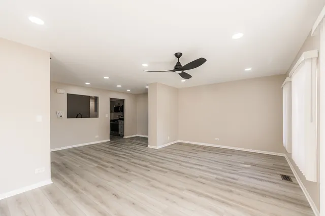 a kitchen with a stove and a microwave