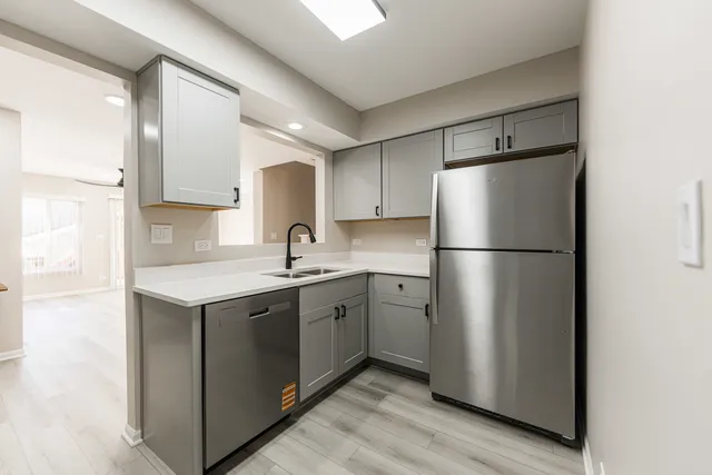 a bathroom with a sink vanity and a mirror