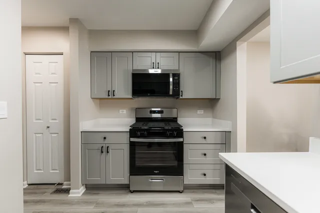 a view of small space with wooden floor