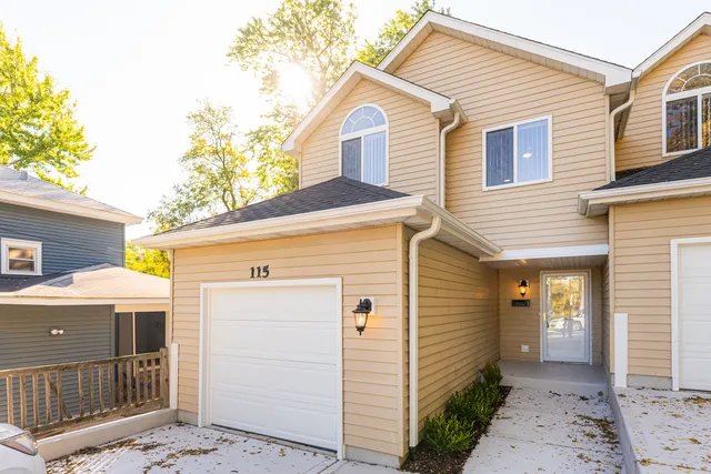 a front view of a house with parking